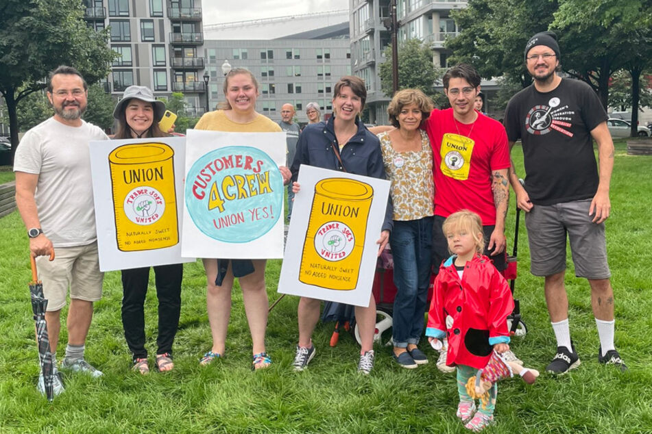 Trader Joe's United members and allies hold a rally in support of the union movement at Minneapolis' Gold Medal Park.
