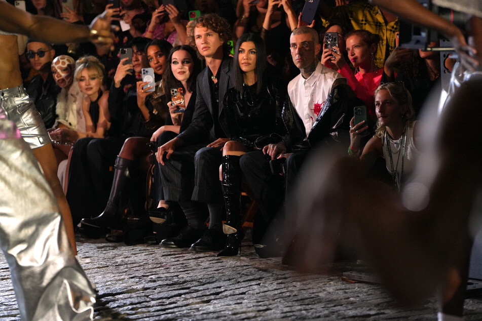 (From l. to r.) Doja Cat, Sabrina Carpenter, Laura Harrier, Dove Cameron, Ansel Elgort, Kourtney Kardashian, and Travis Barker attend Vogue World: New York on September 12, 2022, in New York City.