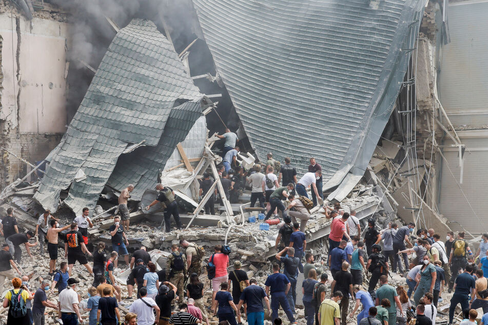 Ukrainian President Volodymyr Zelensky said an unknown number of people trapped under the rubble of the children's hospital.