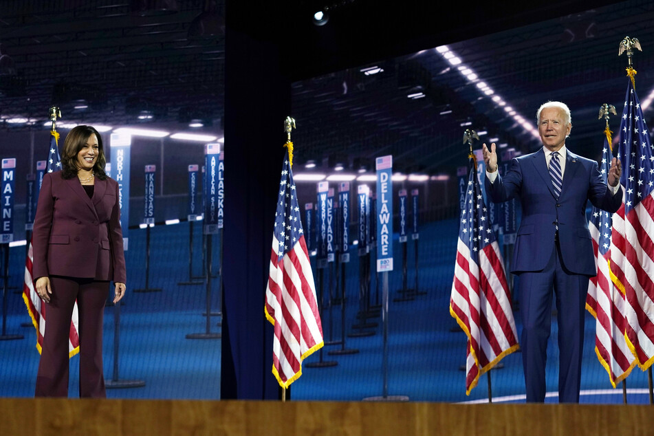 Joe Biden (77), the Democratic presidential candidate, and Kamala Harris (55), the Democratic vice presidential candidate, on stage during the Democratic Convention.