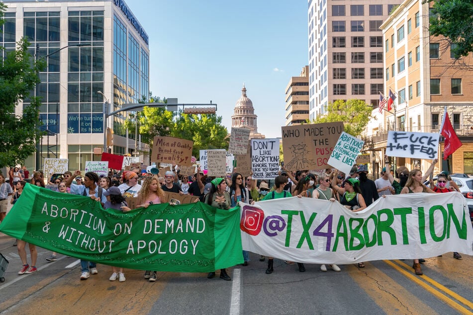 Abortion rights demonstrators march near the State Capitol in Austin, Texas.