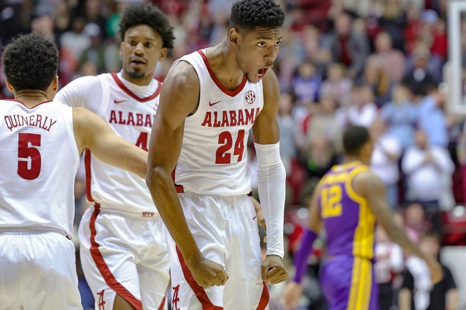 On Tuesday, Brandon Miller (r) became only the second Alabama freshman in the last 15 college basketball seasons to perform three 30-point games in a single season.