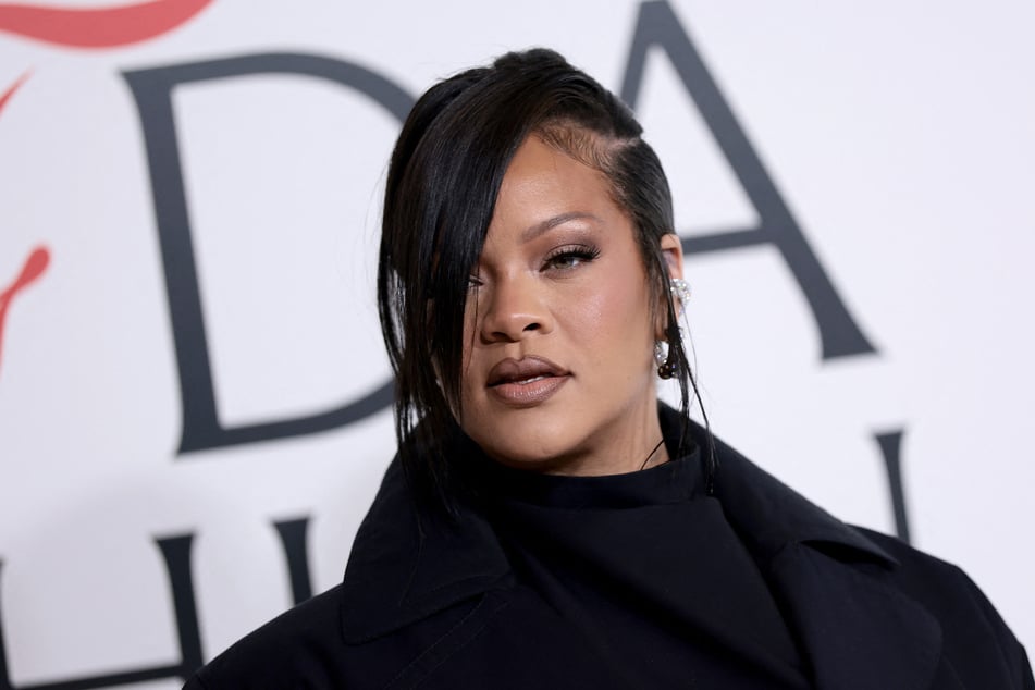 Insiders say Rihanna is "freaking the f out" after a woman fire several shots at her home in Beverly Hills on Sunday.