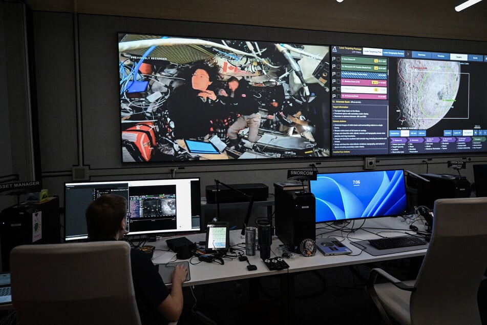 A worker is seen inside the Science Mission Operations Room (SMOR) at Johnson Space Center in Houston, Texas, on Monday.