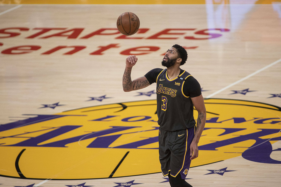 Anthony Davis scored 25 points in the Lakers' 103-100 win over the Warriors in Wednesday's play-in game