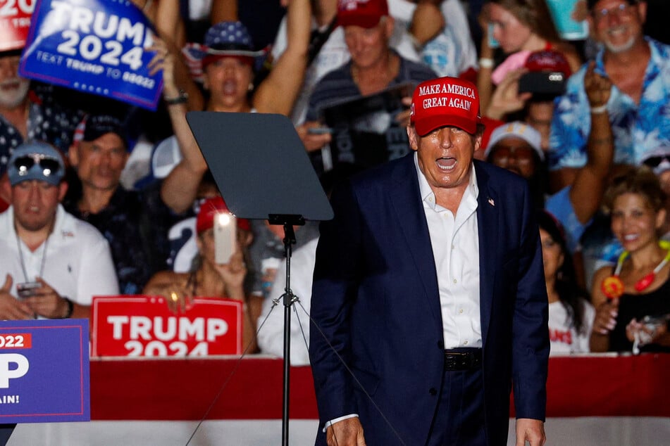 Trump unleashes on Biden in raging rally speech and issues new challenge