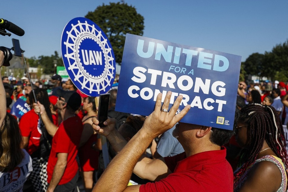 United Auto Workers members and supporters rally after marching in the Detroit Labor Day Parade on September 4, 2023.