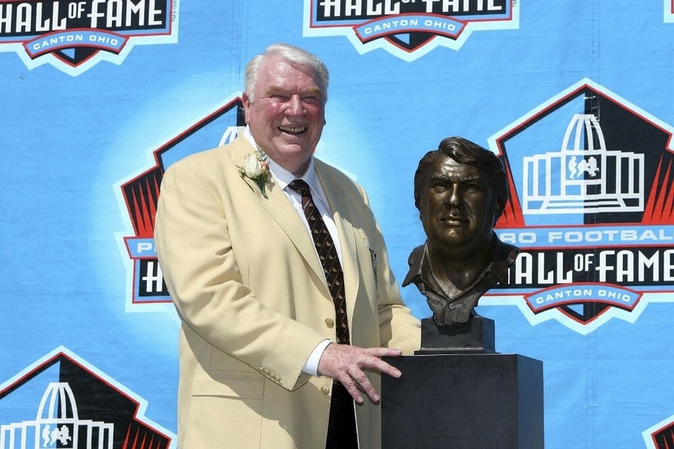 The legendary John Madden poses with his bust after his induction to the Class of 2006 Pro Football Hall of Fame.