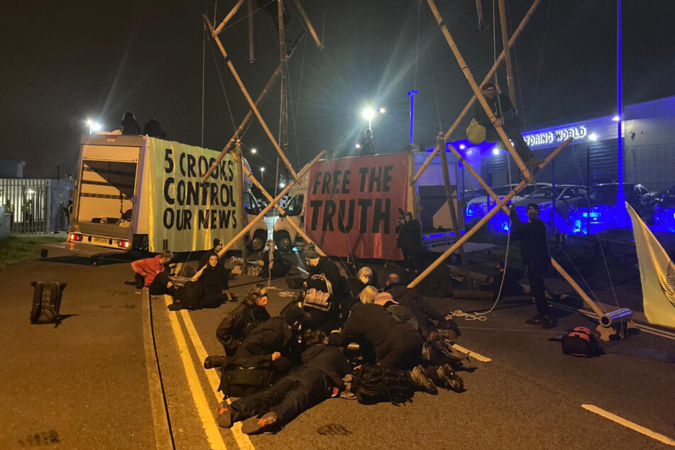 Early on Saturday, Extinction Rebellion set up several blockades in front of British printing houses.