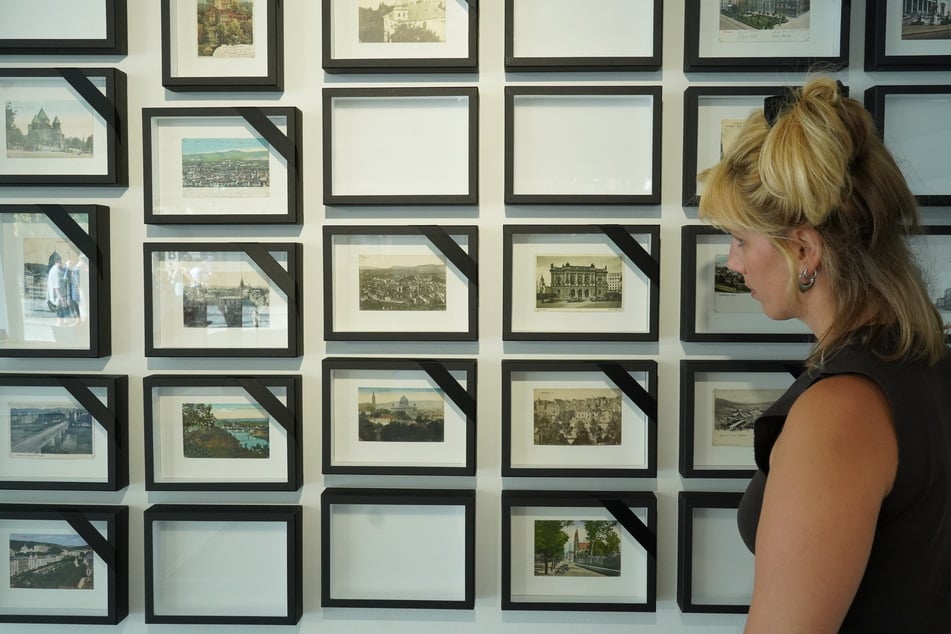 Die Installation "Die Bilder kommen zurück" der Dresdner Künstlerin Susan Donath ist nicht abgeschlossen - es sollen nach und nach weitere Fotos in die noch leeren Rahmen kommen.