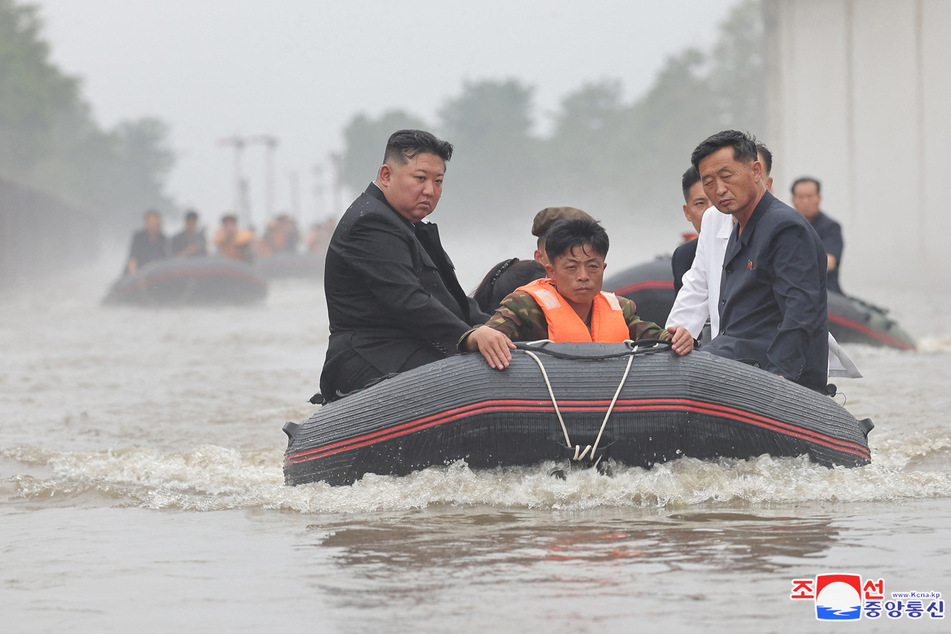 North Korean leader Kim Jong Un and Premier Kim Tok Hun visit a flood-affected area near the border with China.