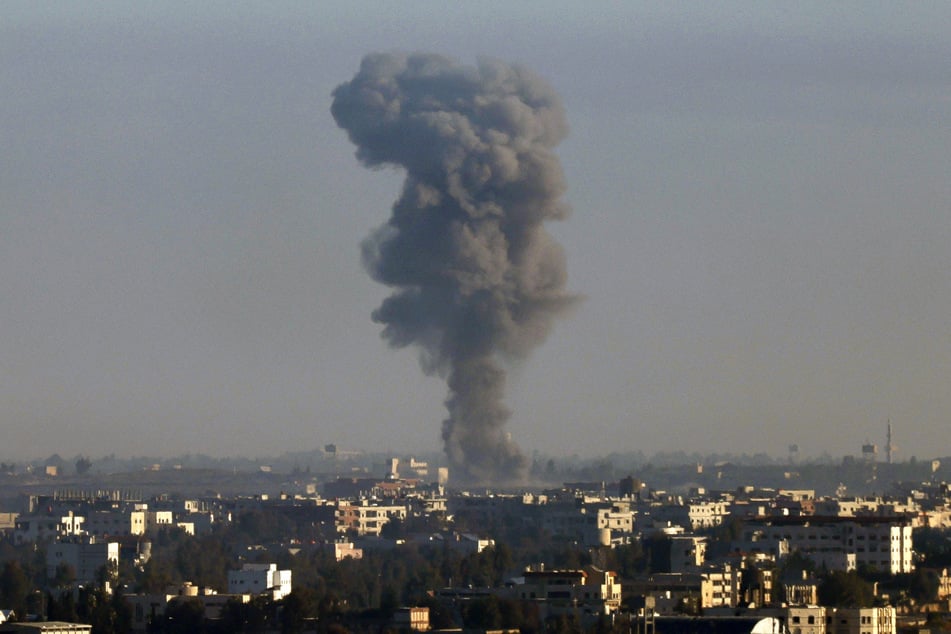 Smoke billows above the Syrian Governorate of Quneitra during Israeli bombardment on December 9, 2024.