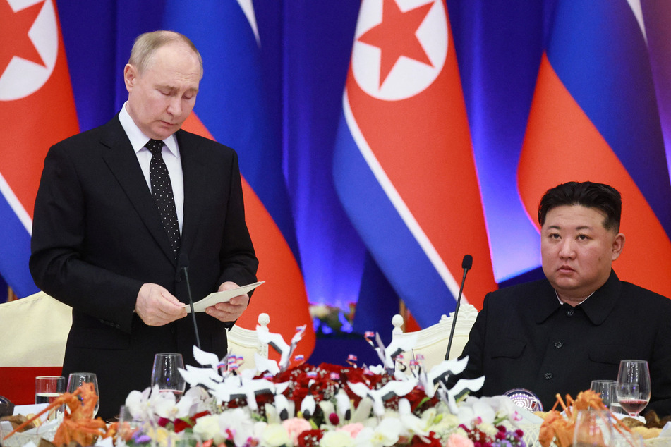 China is reportedly worried North Korea could be emboldened into starting a regional crisis following Russian President Vladimir Putin's (l.) visit.