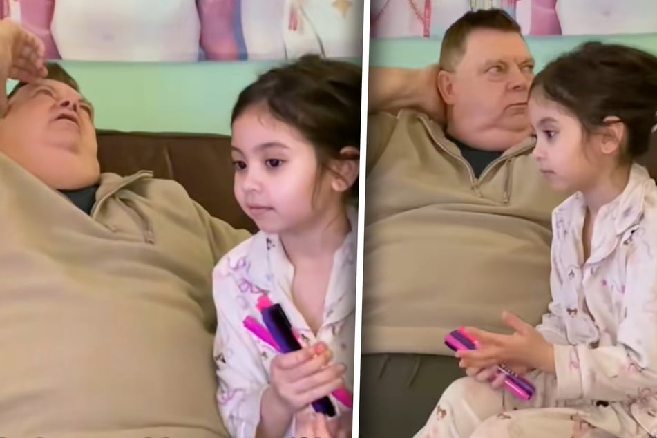 David Davies (62) versucht, seine Tochter Serena (6) nach dem Mobbing der anderen Kinder wieder aufzubauen.