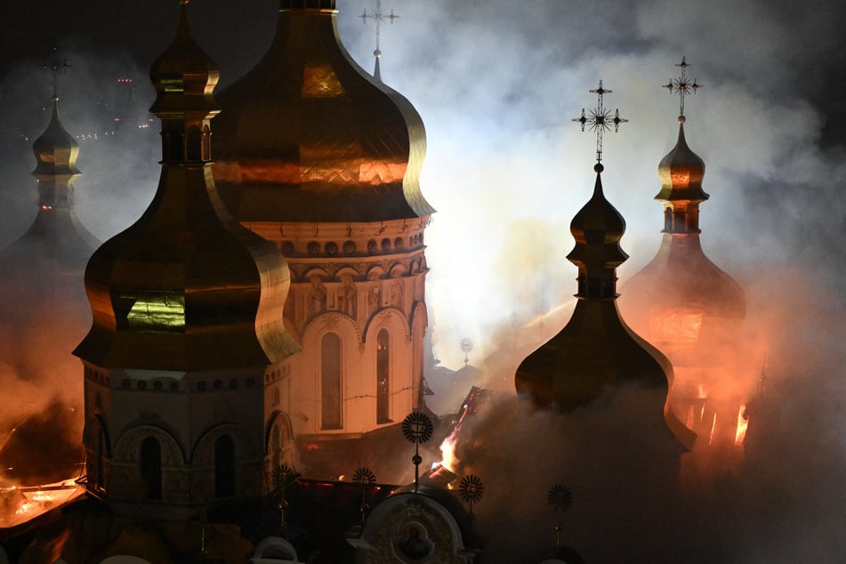 Russian strikes on Ukraine on Sunday night left nine dead and Kyiv's iconic Dormition Cathedral in flames.