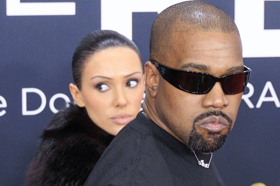 Kanye West (r) and Bianca Censori (l) have been warned by a judge to adhere to the court's strict dress code for a the trial over their previously owned Malibu mansion.