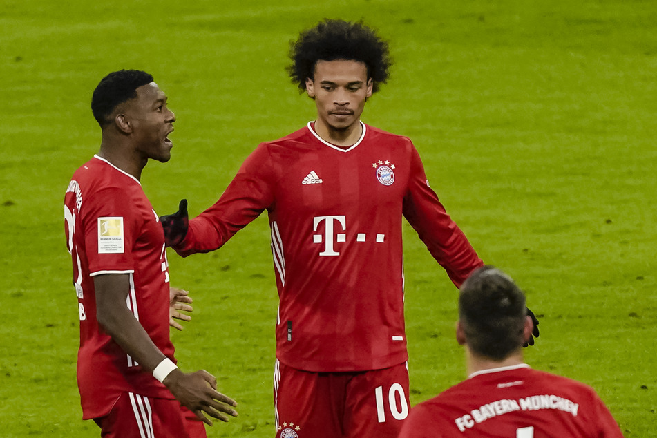 David Alaba (l.) und seine Kollegen vom FC Bayern München taten sich gegen den 1. FSV Mainz 05 lange schwer - einen Sieg gab es dennoch.
