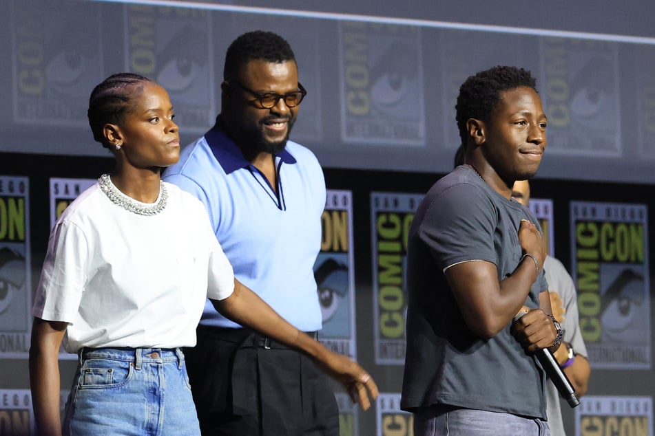 From l. to r.: Letitia Wright, Winston Duke, and David Jonsson speak onstage during the 2026 Comic-Con International: San Diego - Marvel Studios Hall H presentation on July 25, 2026