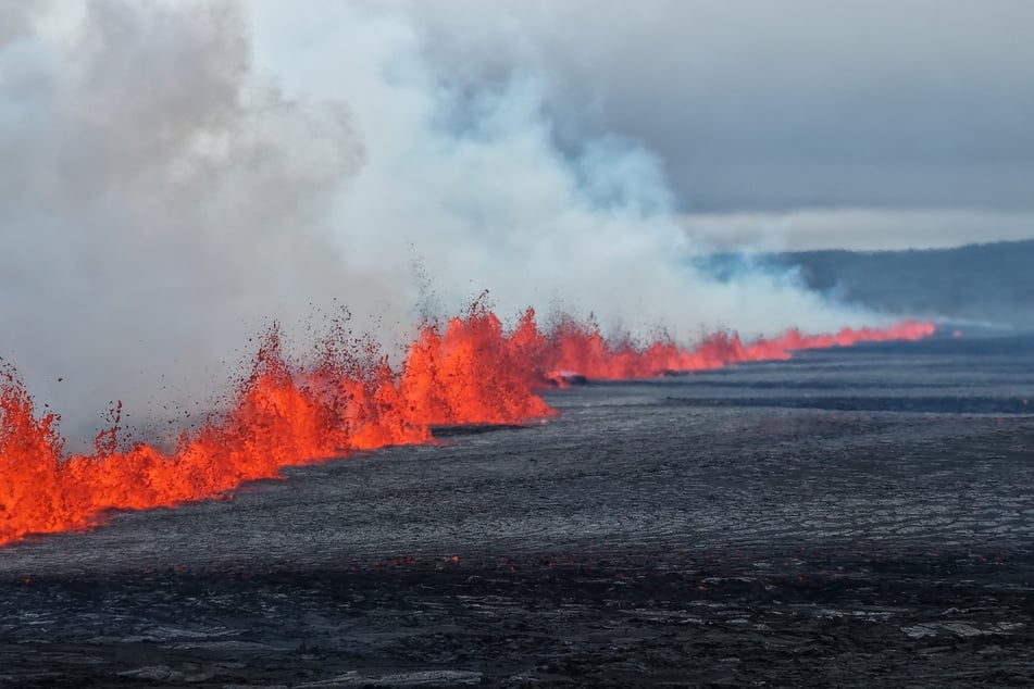 Handout picture released on Wednesday by the Public Defense Department of the State Police Commissioner in Iceland shows lava and smoke erupting from a volcano near Grindavik on the Icelandic peninsula of Reykjanes.