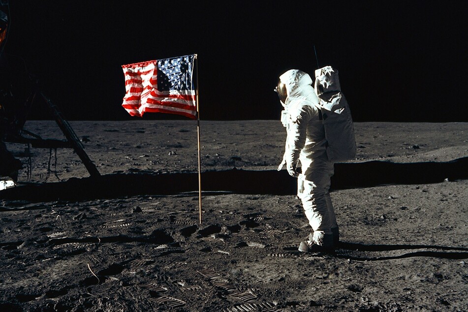 Astronaut Buzz Aldrin poses for a photograph beside the deployed United States flag during an Apollo 11 Extravehicular Activity on the lunar surface in 1969.