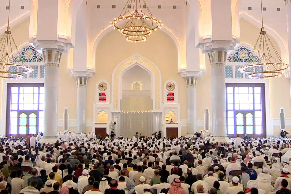 People attend the funeral of assassinated Hamas political chief Ismail Haniyeh at Imam Muhammad ibn Abd al-Wahhab Mosque in Doha, Qatar.