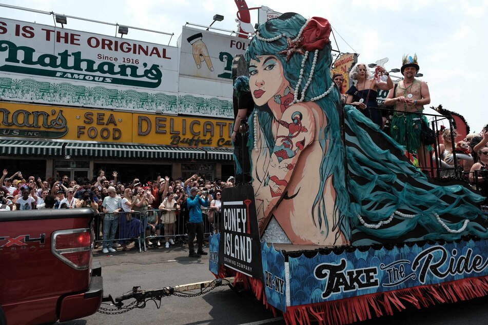 The 41st annual Mermaid Parade took place on Saturday with a float from local brewery Coney Island Brewing Company passing by Coney Island's Nathan's Famous hotdog stand.