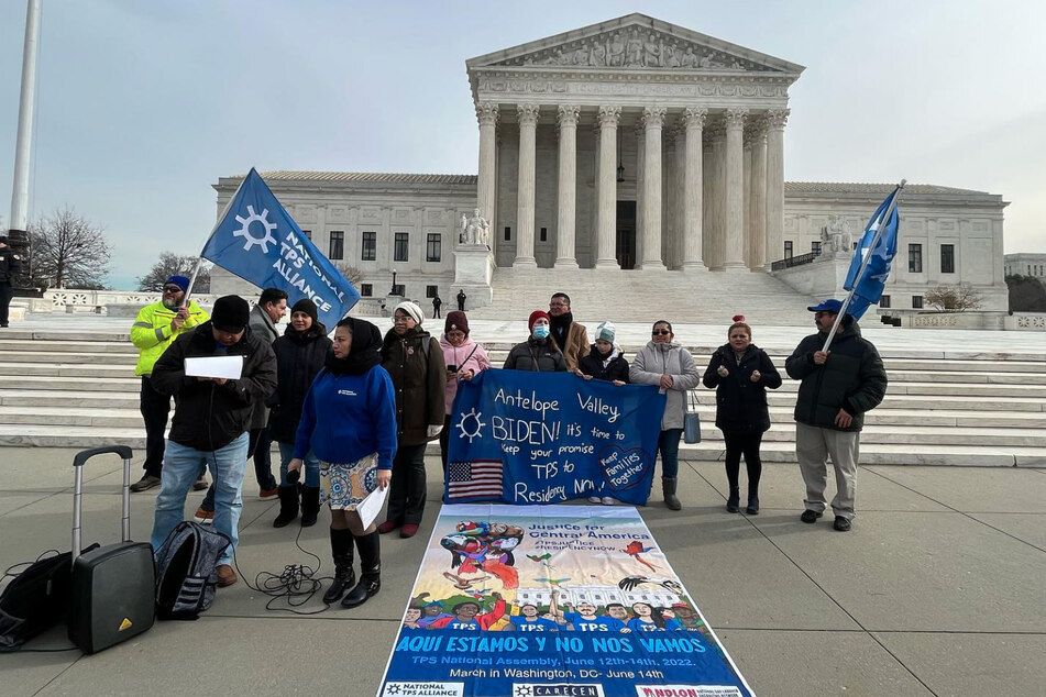 National TPS Alliance members gather for a press conference outside the US Supreme Court on December 14, 2022.