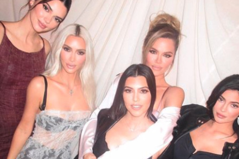 Kim Kardashian (l) showed off all the love she received during her extravagant birthday dinner.