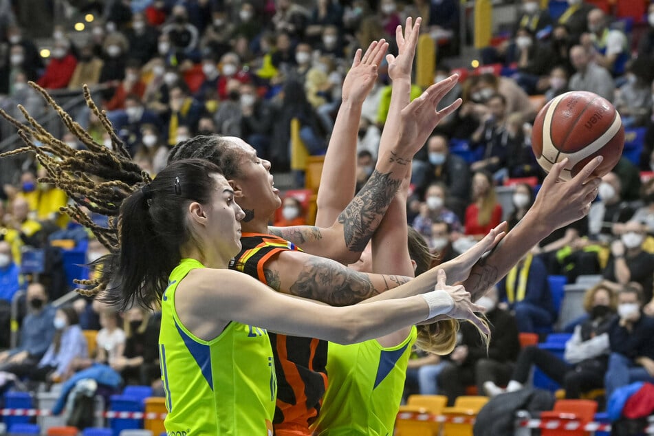 Brittney Griner (c.) had been playing with Russia's UMMC Ekaterinburg in a European women's pro basketball league this winter.