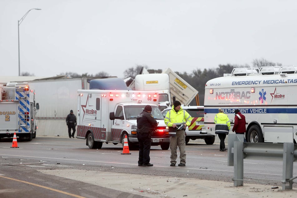 First responders at the scene of a massive pile-up of cars on I-35W northbound near downtown Fort Worth.