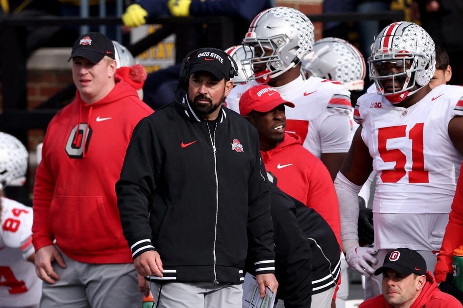Ohio State football is embracing major changes, head coach Ryan Day (c.) announced in his first media appearance since the Buckeyes' Cotton bowl loss to Missouri.