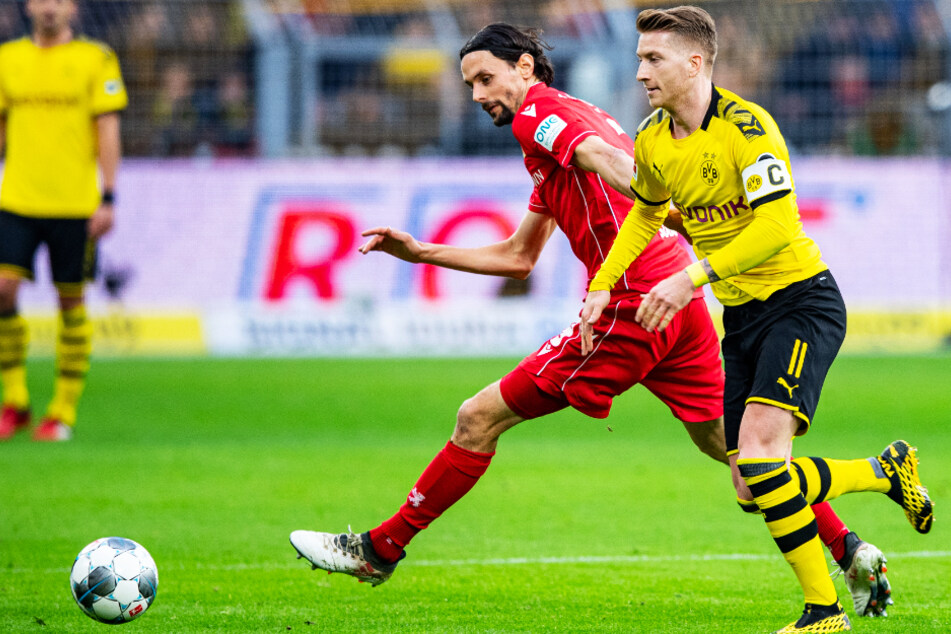 Neven Subotic (32, v.-l.) spielte am 1. Februar 2020 für den 1. FC Union Berlin in Dortmund um Kapitän Marco Reus (31). Zwar verloren die Eisernen mit 0:5, doch der Innenverteidiger wurde anschließend groß von den Fans gefeiert.