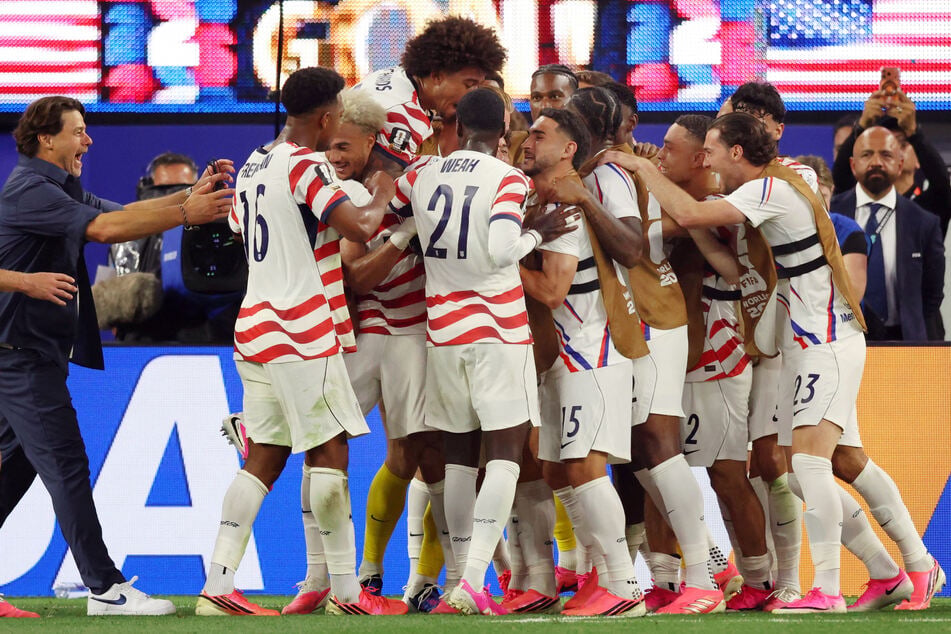 Giovanni Reyna of the US celebrates scoring the fourth goal against Paraguay with coach Mauricio Pochettino and teammates after their World Cup opener on June 12, 2026.