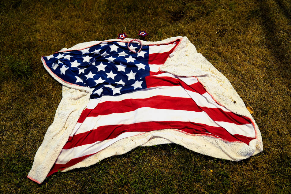 Belongings of parade goers were seen abandoned along the parade route after a mass shooting at a Fourth of July parade in Highland Park, Illinois.