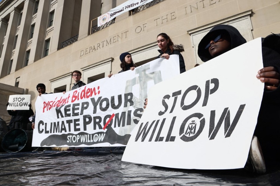 Climate activists hold a demonstration to urge President Biden to reject the Willow Project at the US Department of Interior.