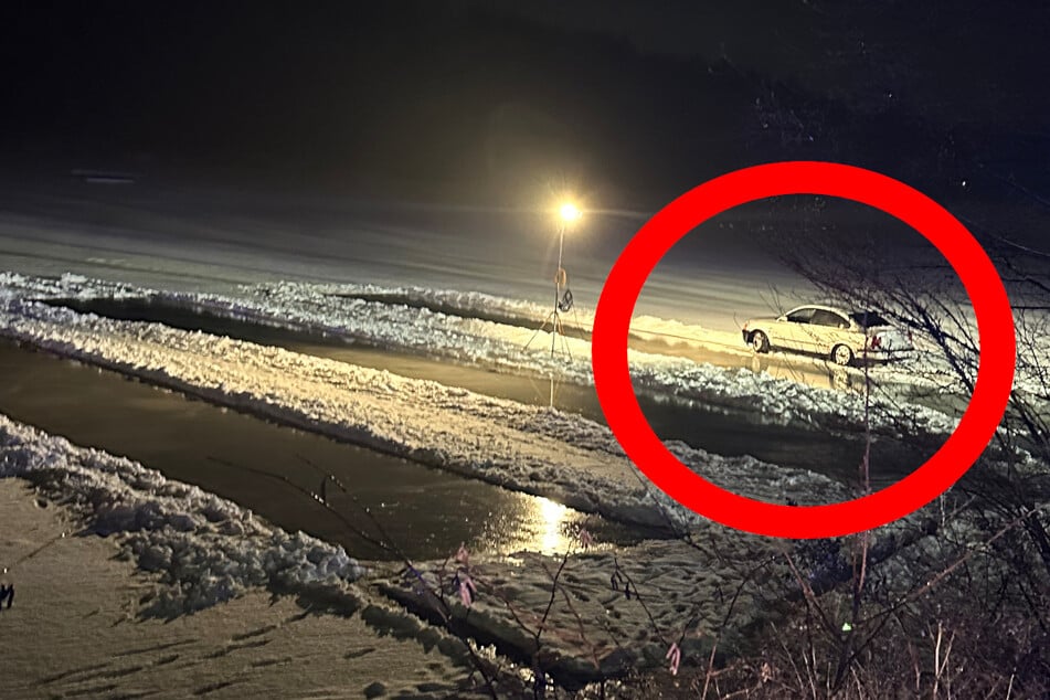 Feuerwehr beim Eisstockschießen auf See, da rutscht plötzlich ein Auto vorbei