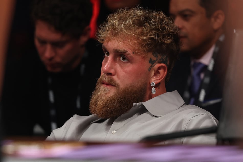Jake Paul watches a bantamweight bout between Ebanie Bridges and Alexis Araiza at Coliseo Roberto Clemente in San Juan, Puerto Rico, on January 3, 2026.