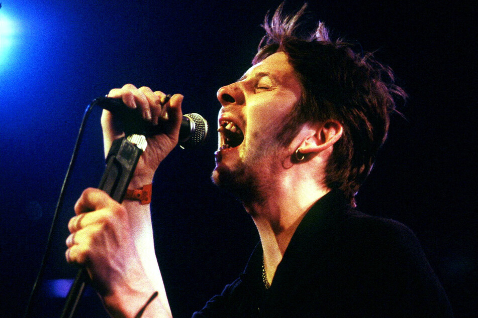 Shane MacGowan, co-founder and lead singers of Irish folk punk band The Pogues, passed away at the age of 65.