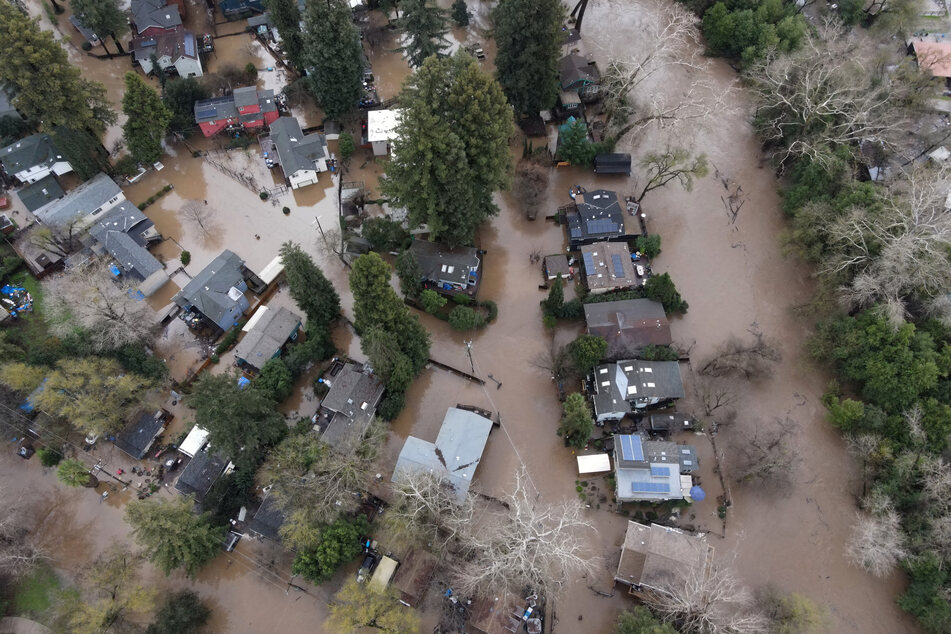 The storms in Norther California caused the San Lorenzo River to flood communities, such as the one in Felton Grove.