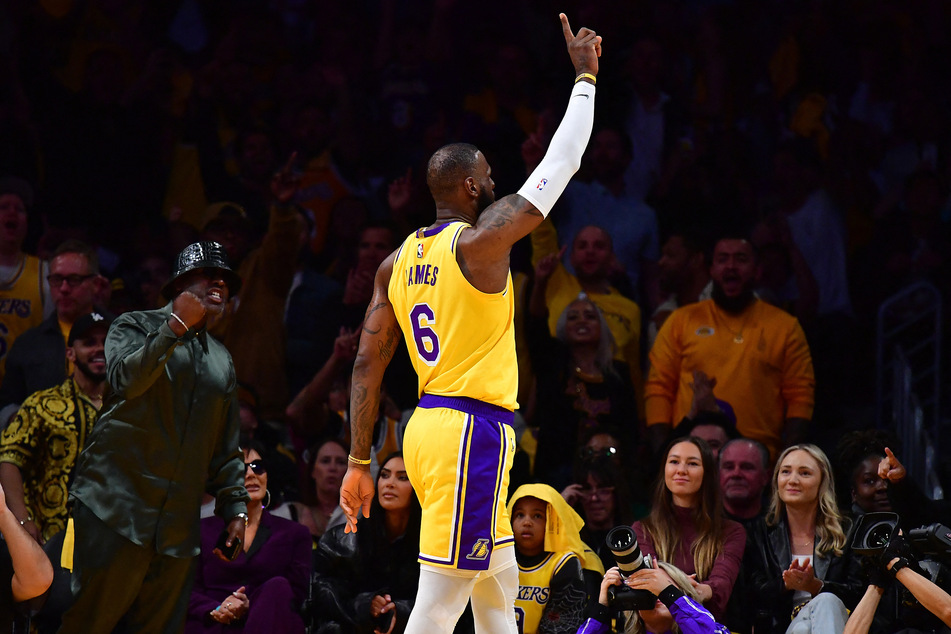 LeBron James grabbed a personal-best 20 rebounds as he carried the Los Angeles Lakers to a 115-108 home win in Game 4 against the Memphis Grizzlies.
