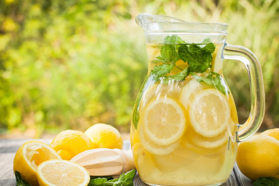 Lemonade is best served over ice with some lemon slices.