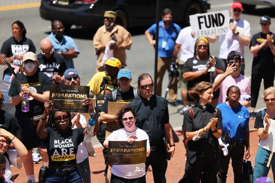 New Jerseyans rally for reparations outside the Newark City Hall ahead of Juneteenth 2022.