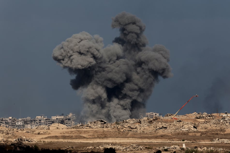 A smoke plume billows following Israeli bombardment of the Gaza Strip on October 10, 2025.