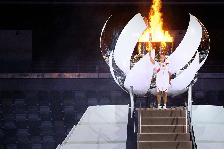 Naomi Osaka lit the Olympic cauldron at the opening ceremony on Friday.