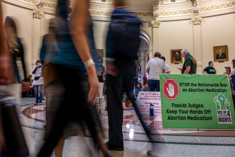 Abortion rights activists gather during an International Women's Day demonstration at the Texas State Capitol in Austin on March 8, 2023.