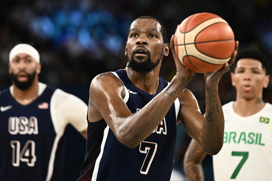 Kevin Durant became Team USA's all-time top scorer at the Olympics as the Americans beat Brazil 122-87 to advance to the semifinals at the Paris Game.