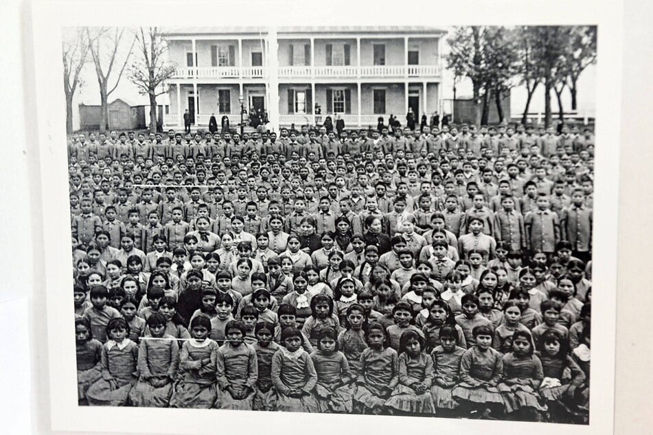 A historical photo pictures Indigenous children at the notorious Carlisle Indian Industrial School in Pennsylvania.