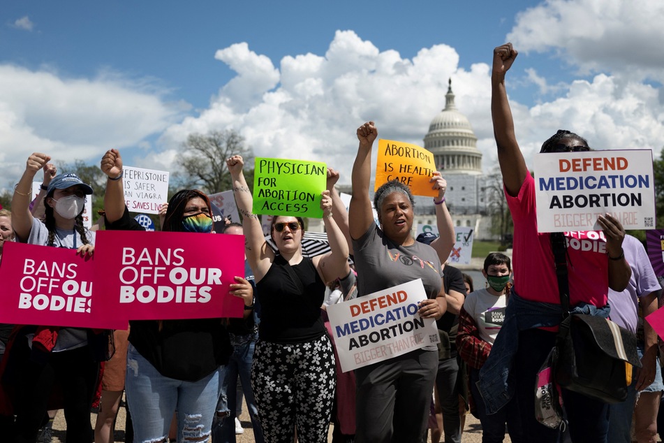 Abortion rights advocates rallied at the US Capitol on Friday before SCOTUS blocked a lower court order aiming to limit access to mifepristone.