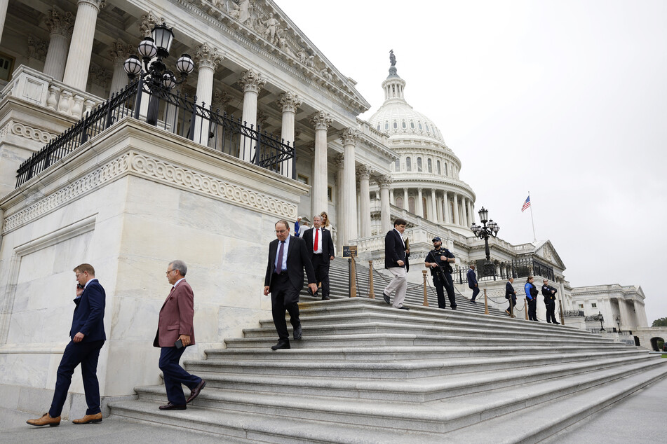 Members of the US House of Representatives leave the U.S. Capitol after a series of votes on September 25, 2024, in Washington, DC. In a 341 to 82 vote, the House of Representatives passed legislation to avoid a funding lapse and government shutdown.