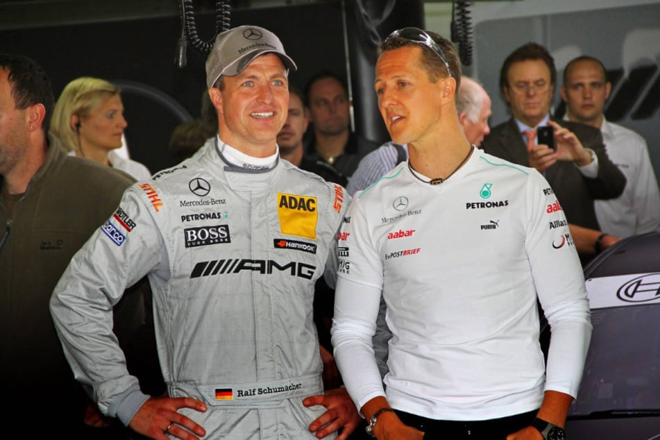 Viele Jahre waren Ralf (l.) und Michael Schumacher (r.) Teil des Formel-1-Zirkus. (Archivbild)